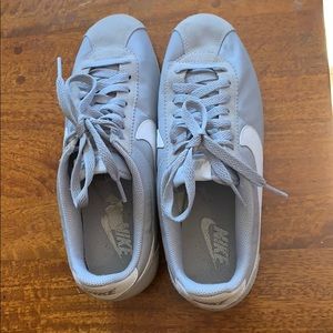 Grey Nike Cortez shoes